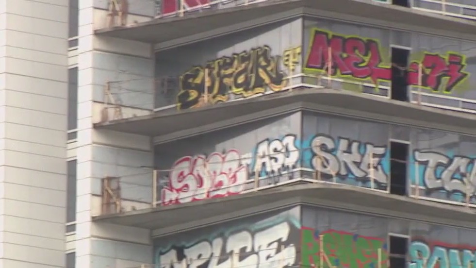 More arrests at graffiti-covered high-rise